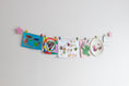 Load image into Gallery viewer, Kids art display with pink stars