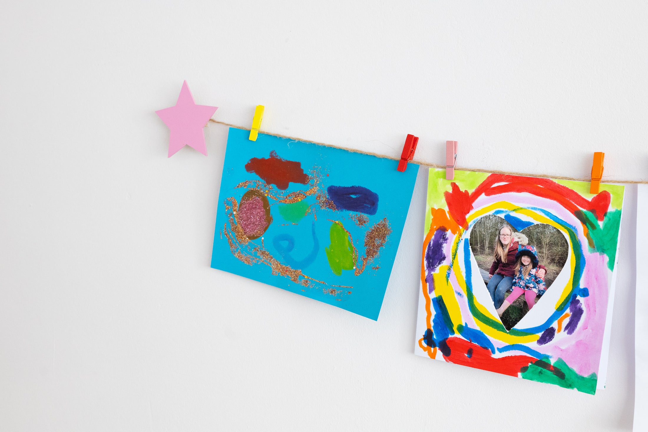 Kids art display with pink stars