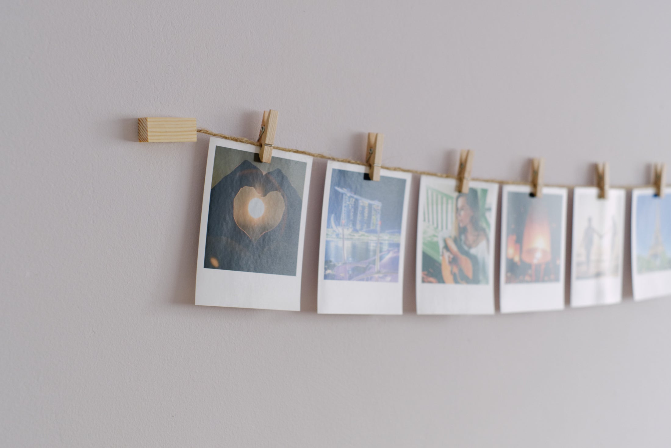 Minimalist Wood and Twine Clothespeg Photo Display