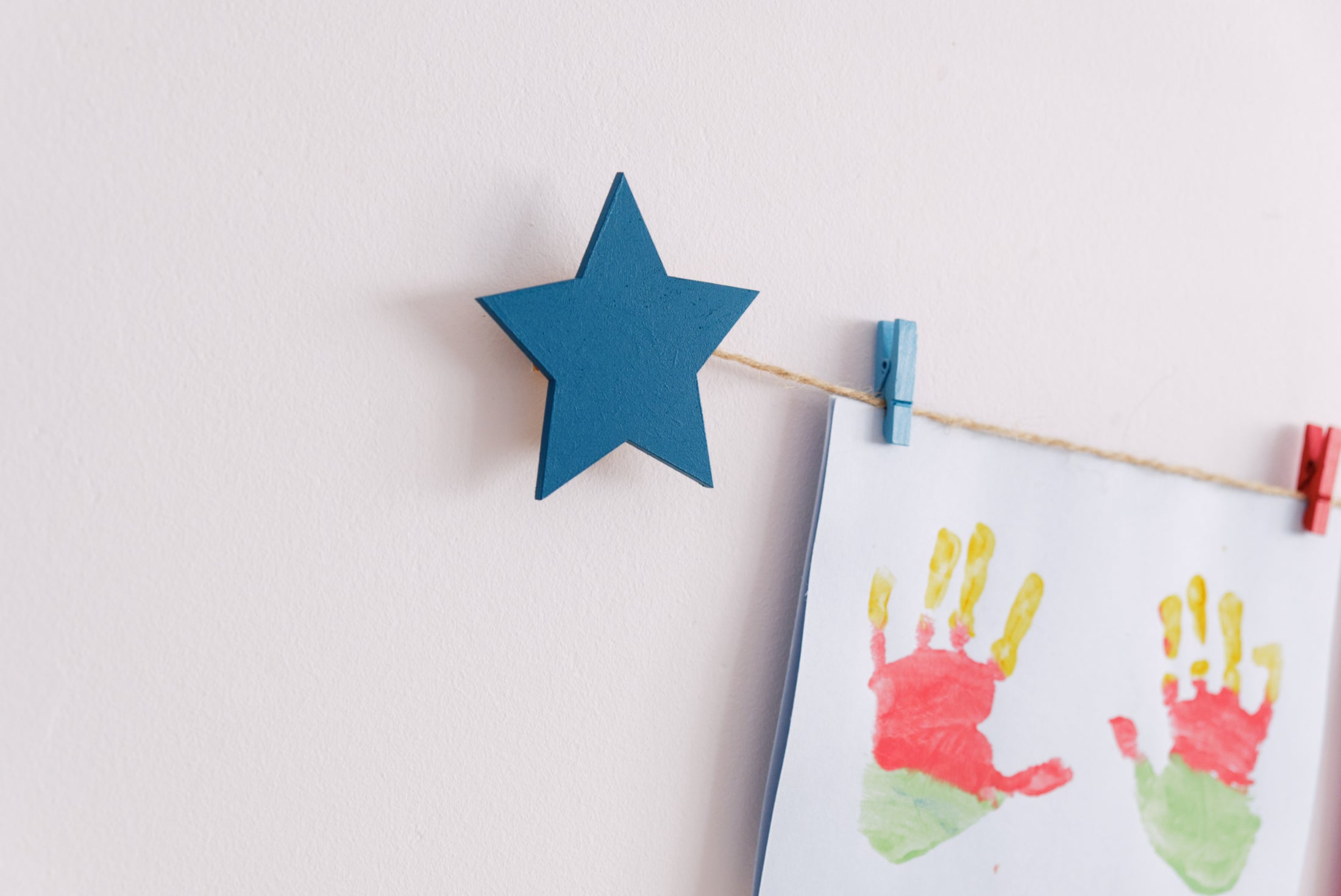 Kids art display with teal stars