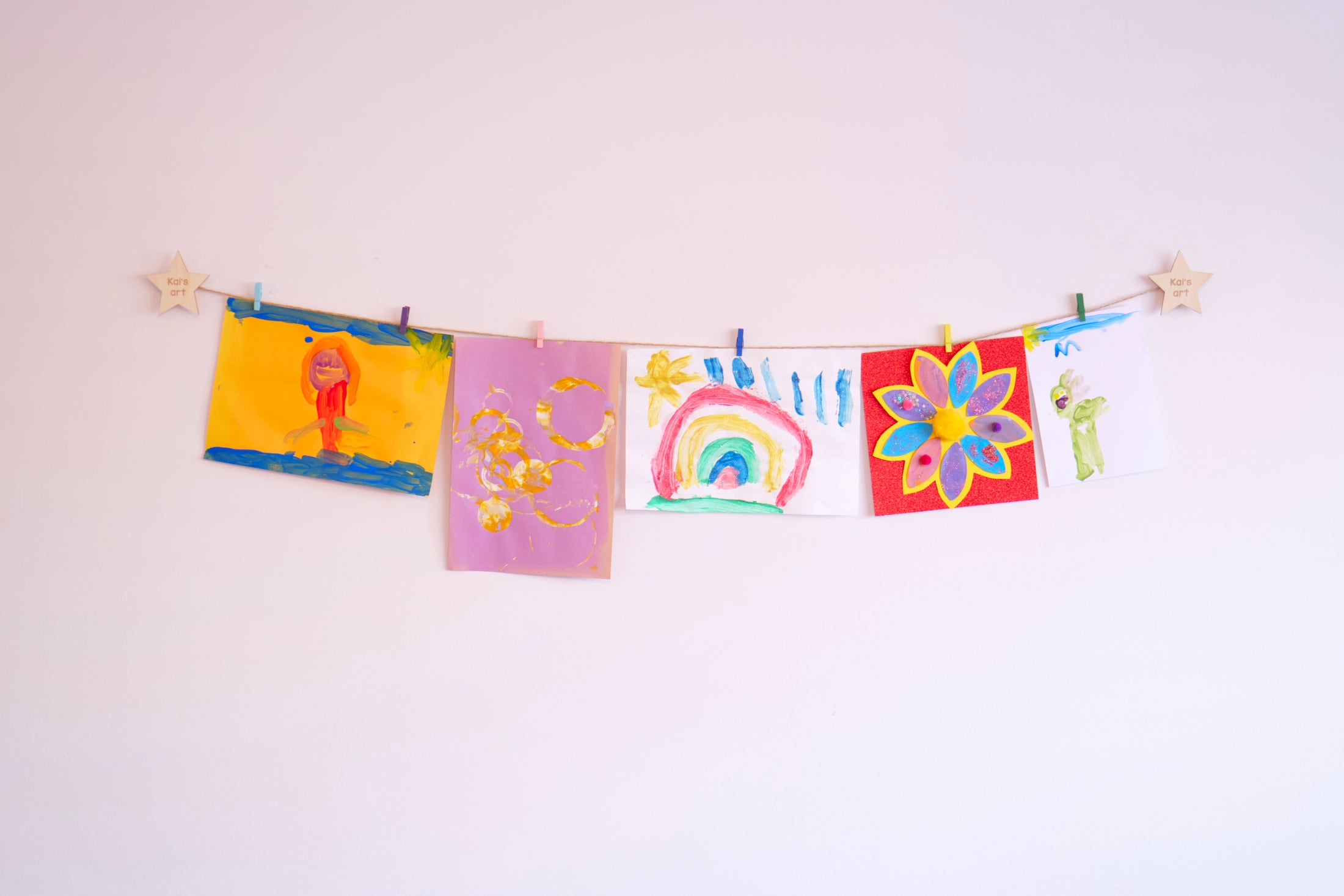 Kids art display with personalised wooden stars
