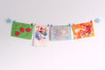 Load image into Gallery viewer, Kids art display with blue stars