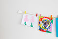 Load image into Gallery viewer, White clouds kids art display
