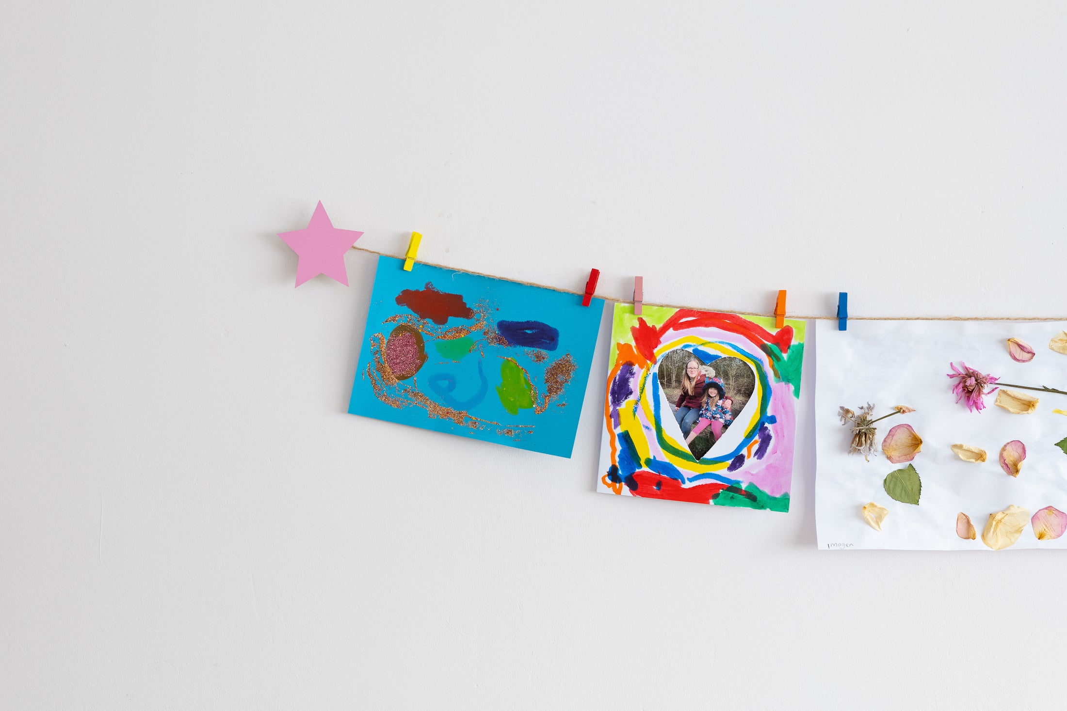 Kids art display with pink stars