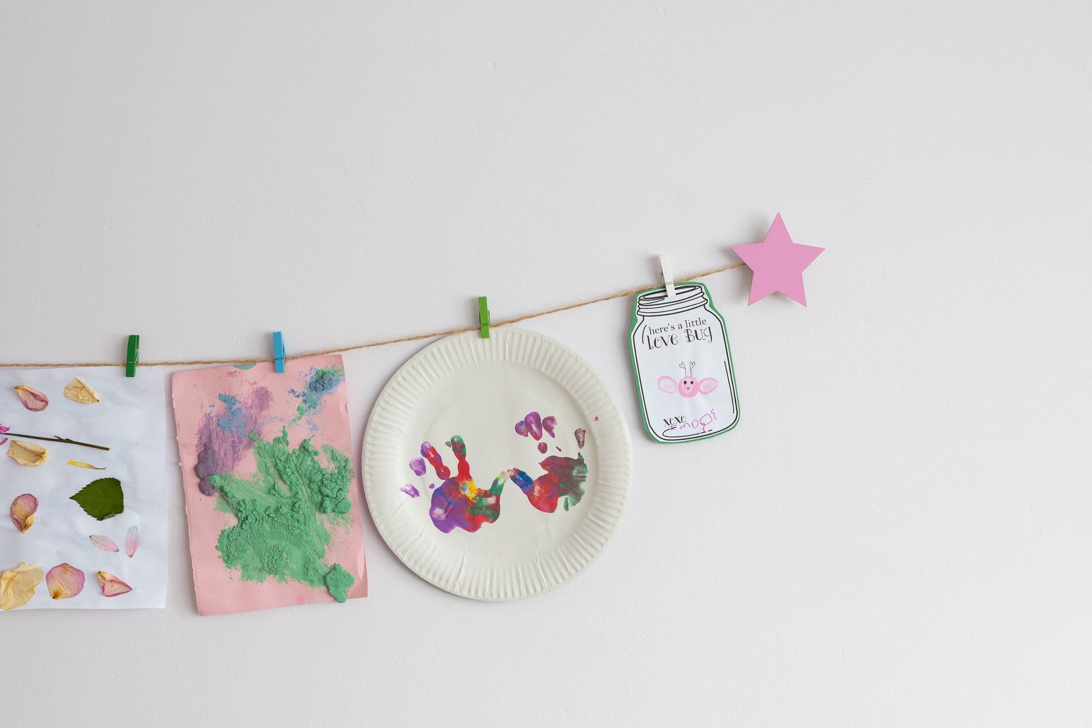 Kids art display with pink stars