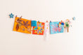 Load image into Gallery viewer, Kids art display with personalised stars
