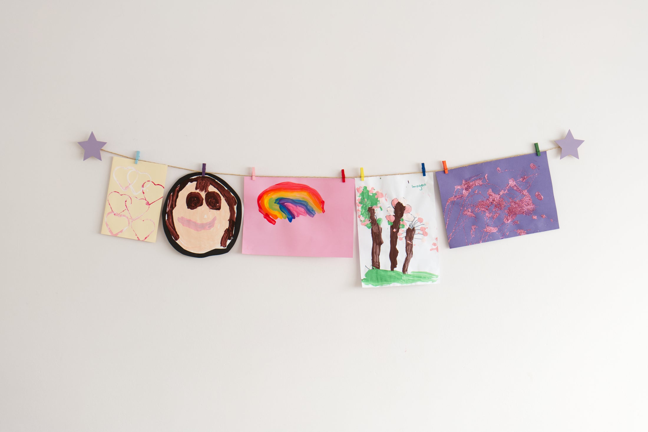 Kids art display with lavender stars