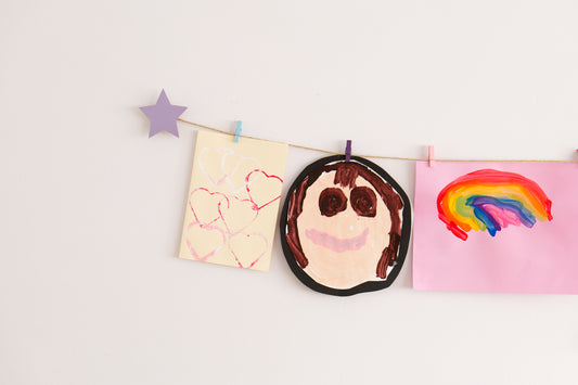 Kids art display with lavender stars