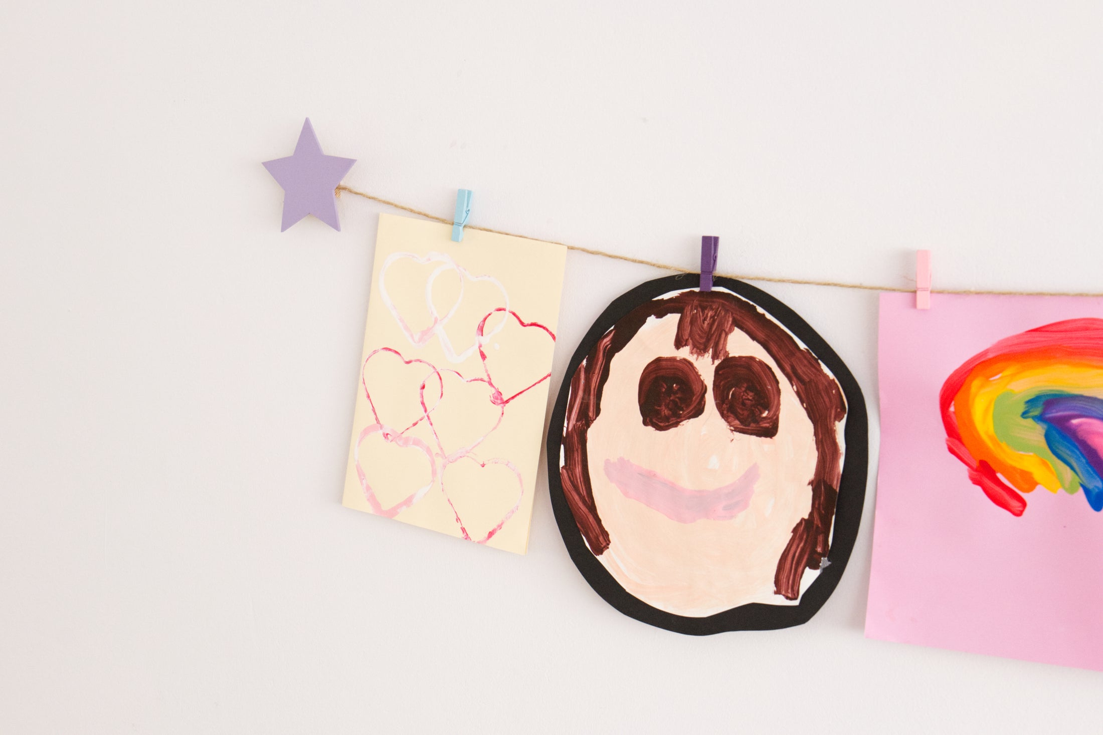 Kids art display with lavender stars