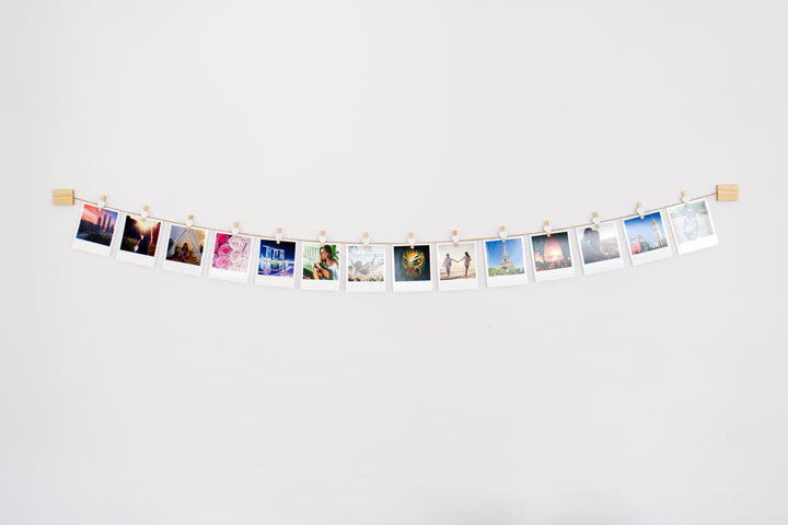 White hearts clothes peg photo display