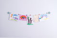 Load image into Gallery viewer, Kids art display with sage green stars
