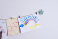 Load image into Gallery viewer, Kids art display with sage green stars
