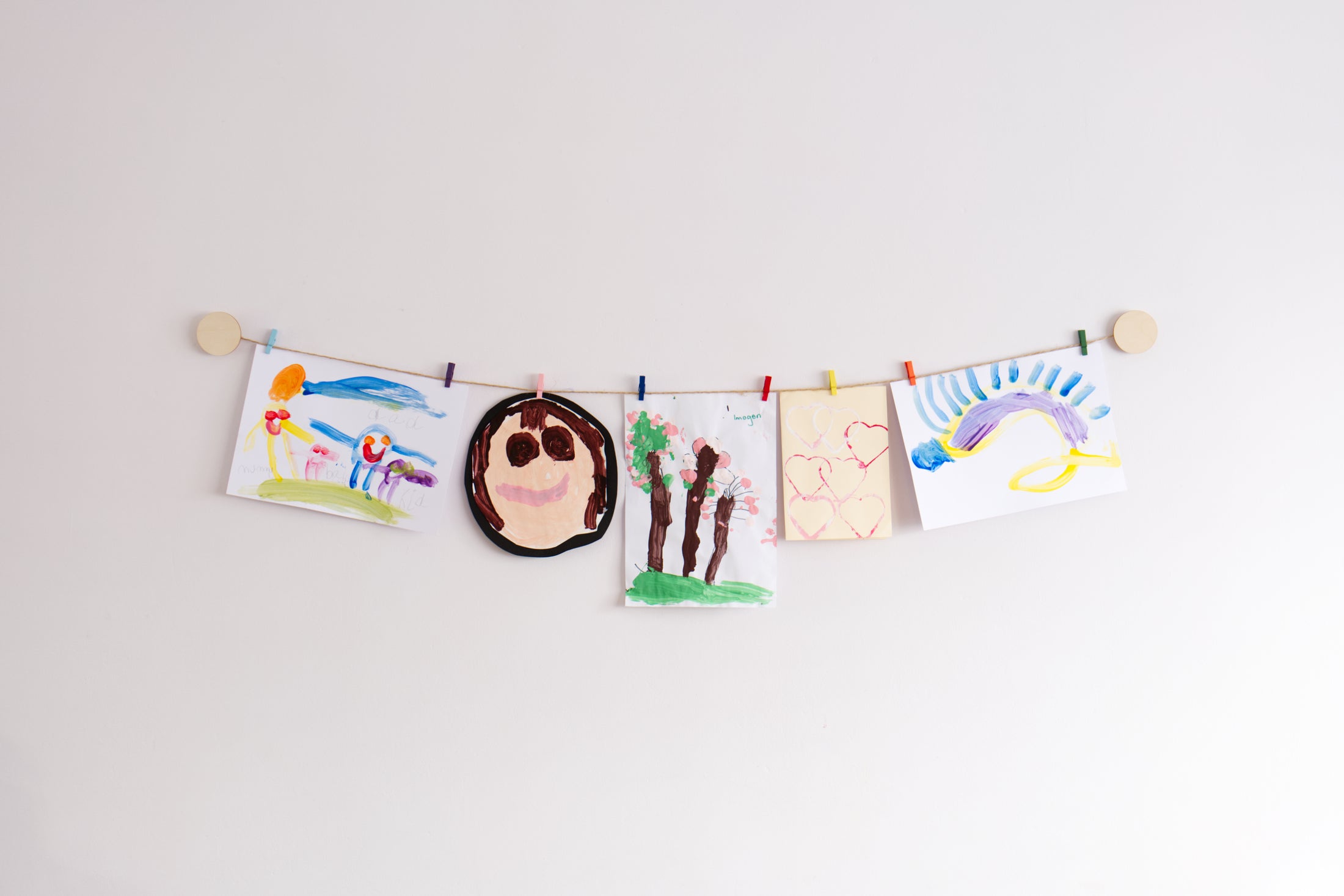 Kids art display with wooden circles