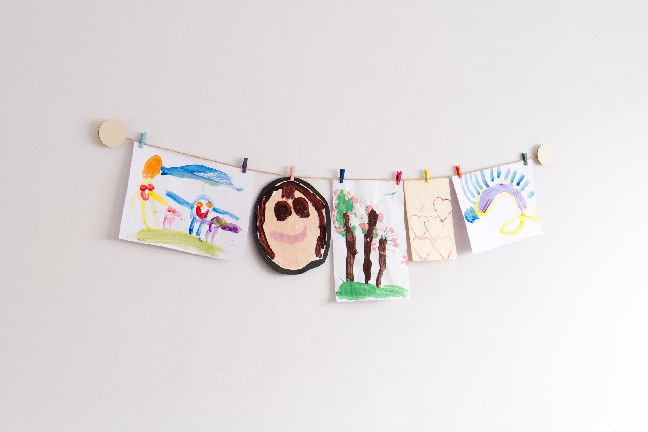 Kids art display with wooden circles