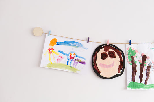 Kids art display with wooden circles