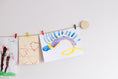 Load image into Gallery viewer, Kids art display with wooden circles
