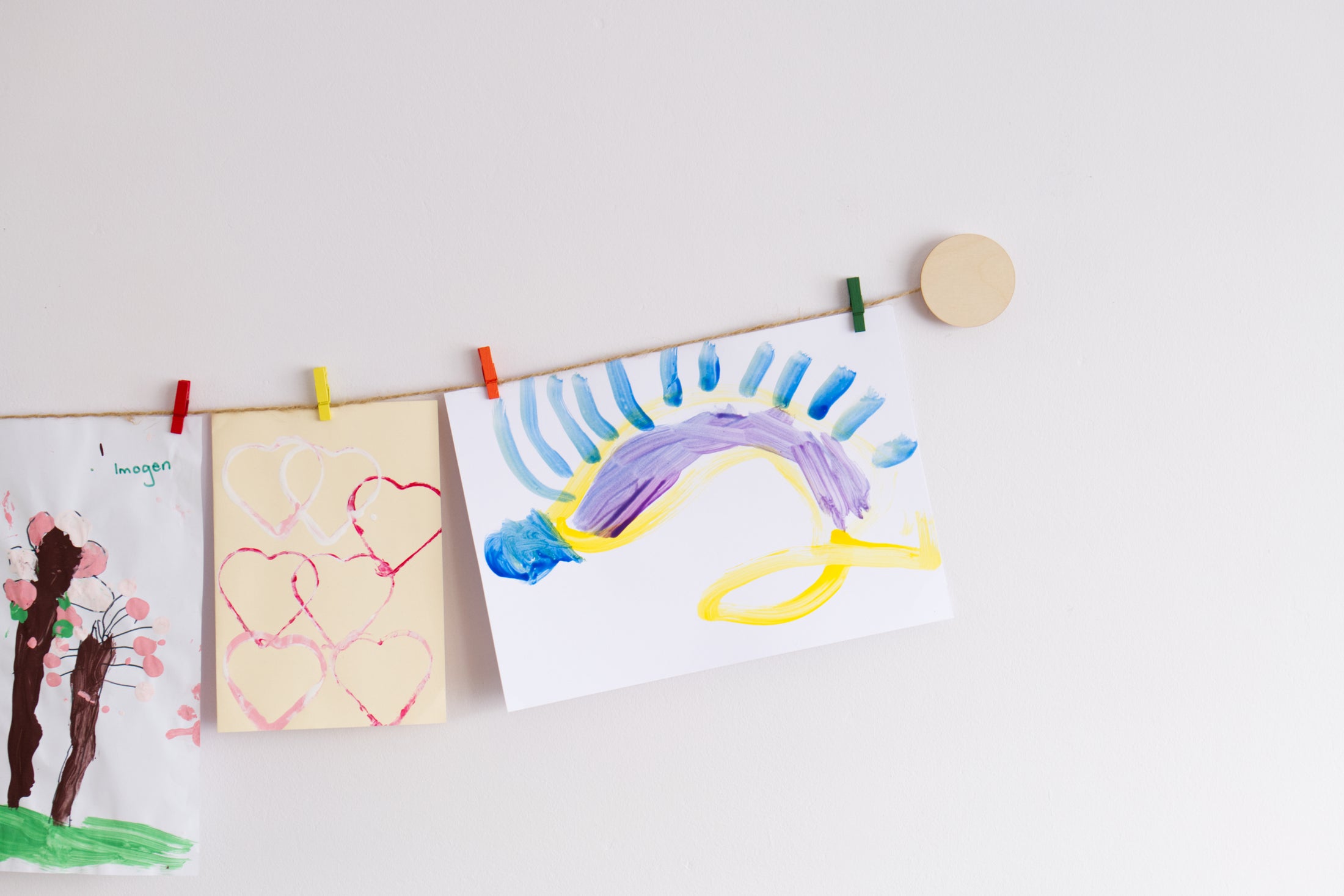 Kids art display with wooden circles