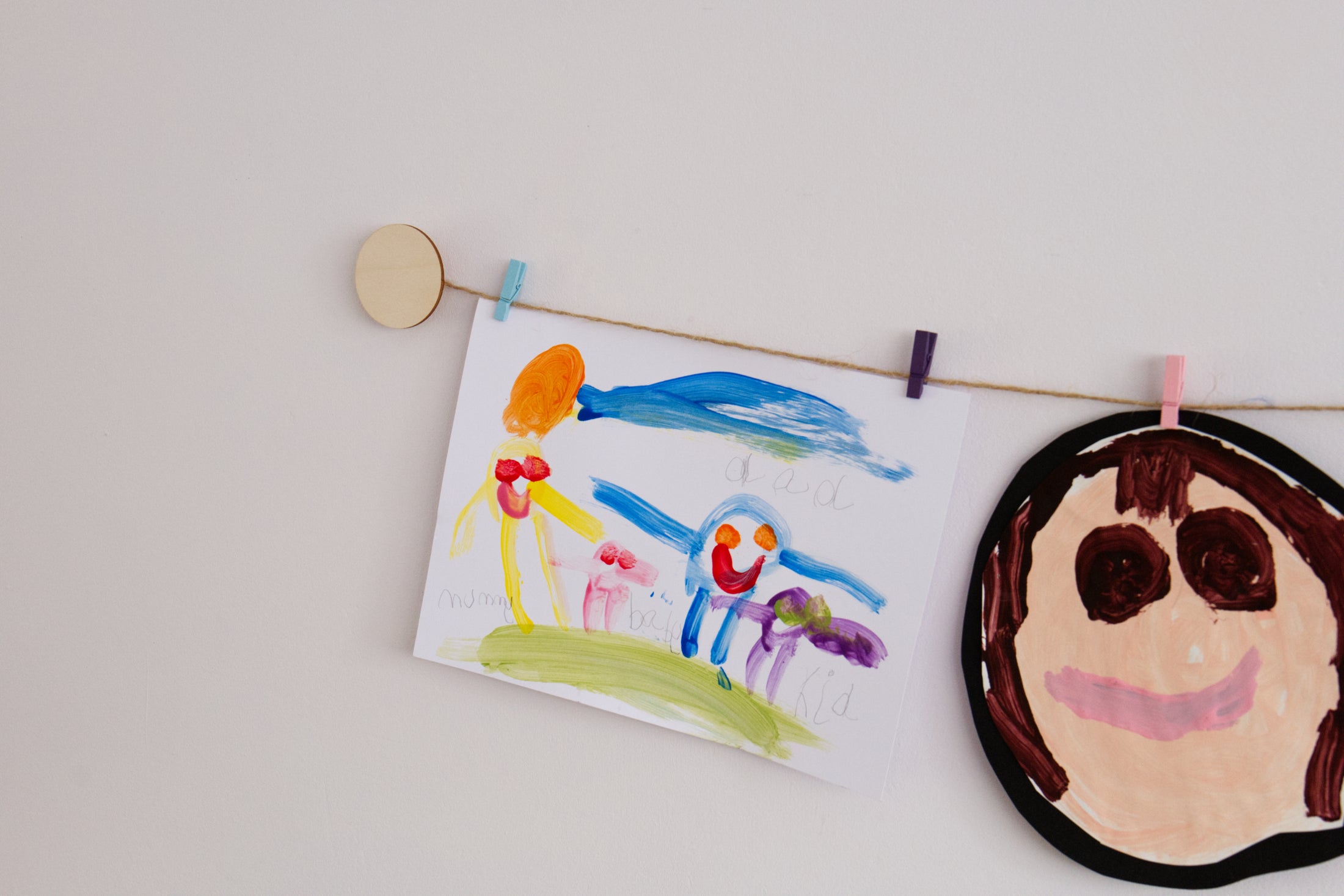 Kids art display with wooden circles
