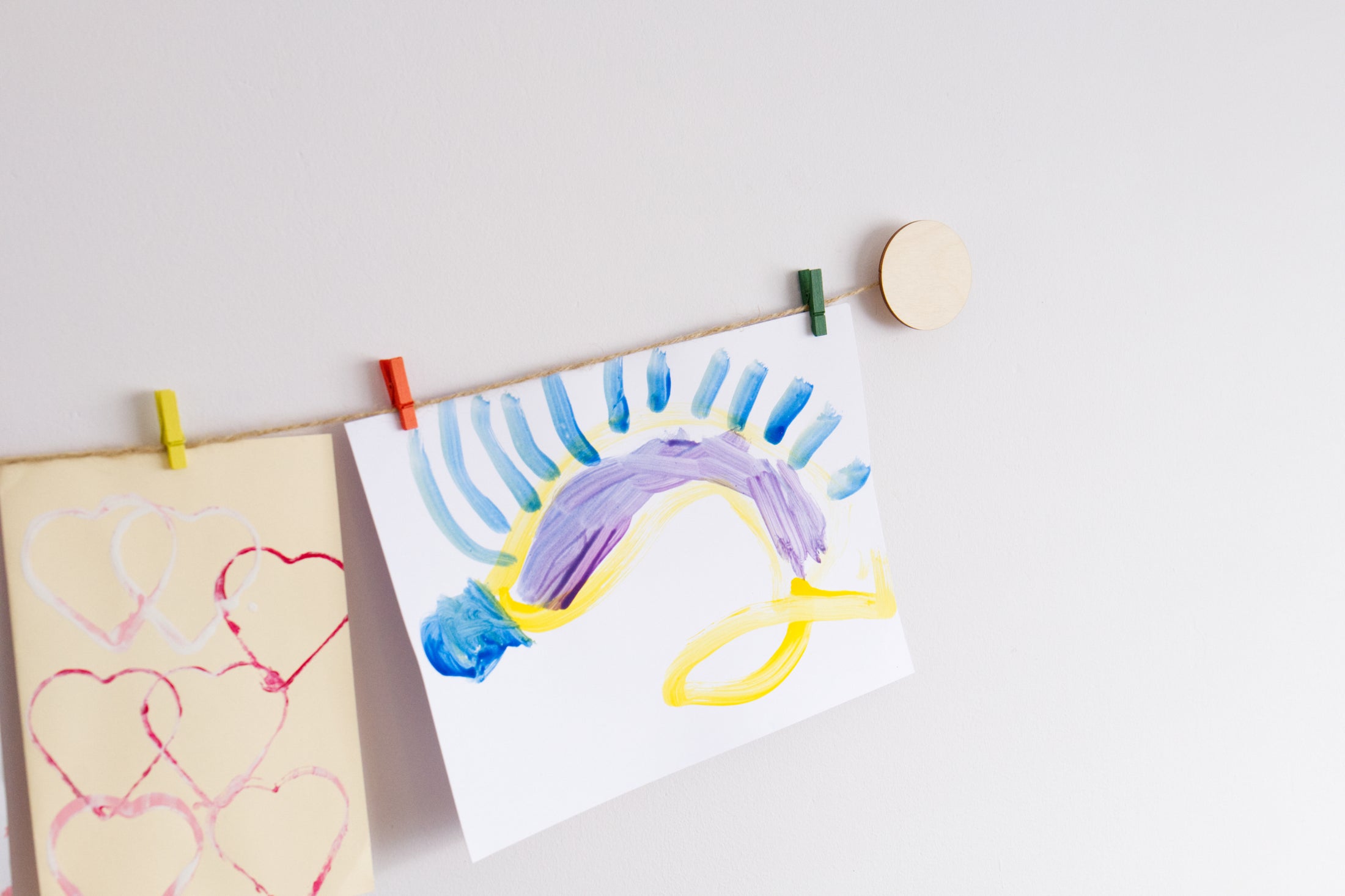 Kids art display with wooden circles