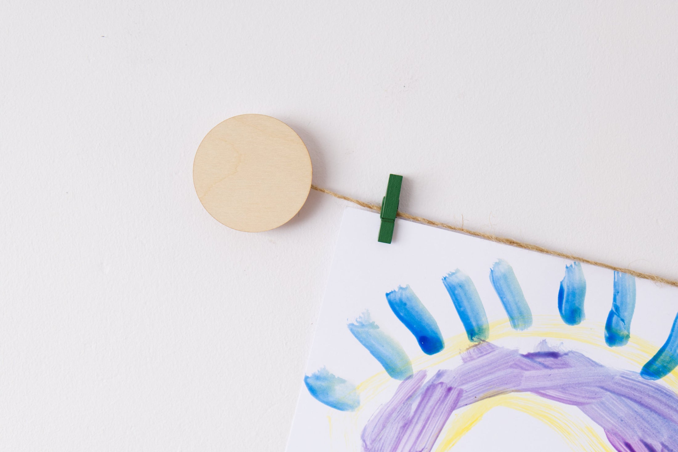 Kids art display with wooden circles