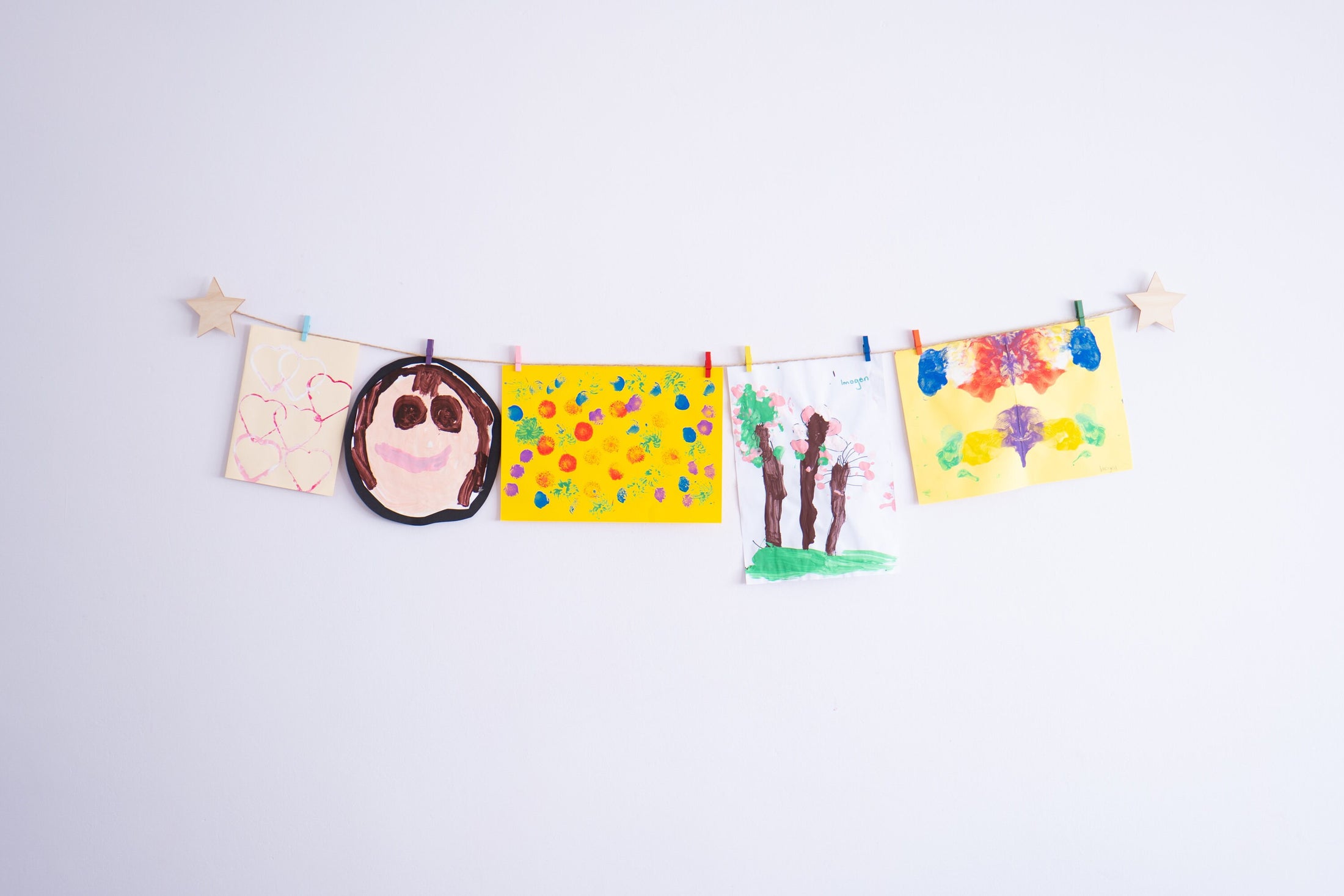 Kids art display with wooden stars