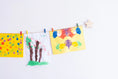 Load image into Gallery viewer, Kids art display with wooden stars
