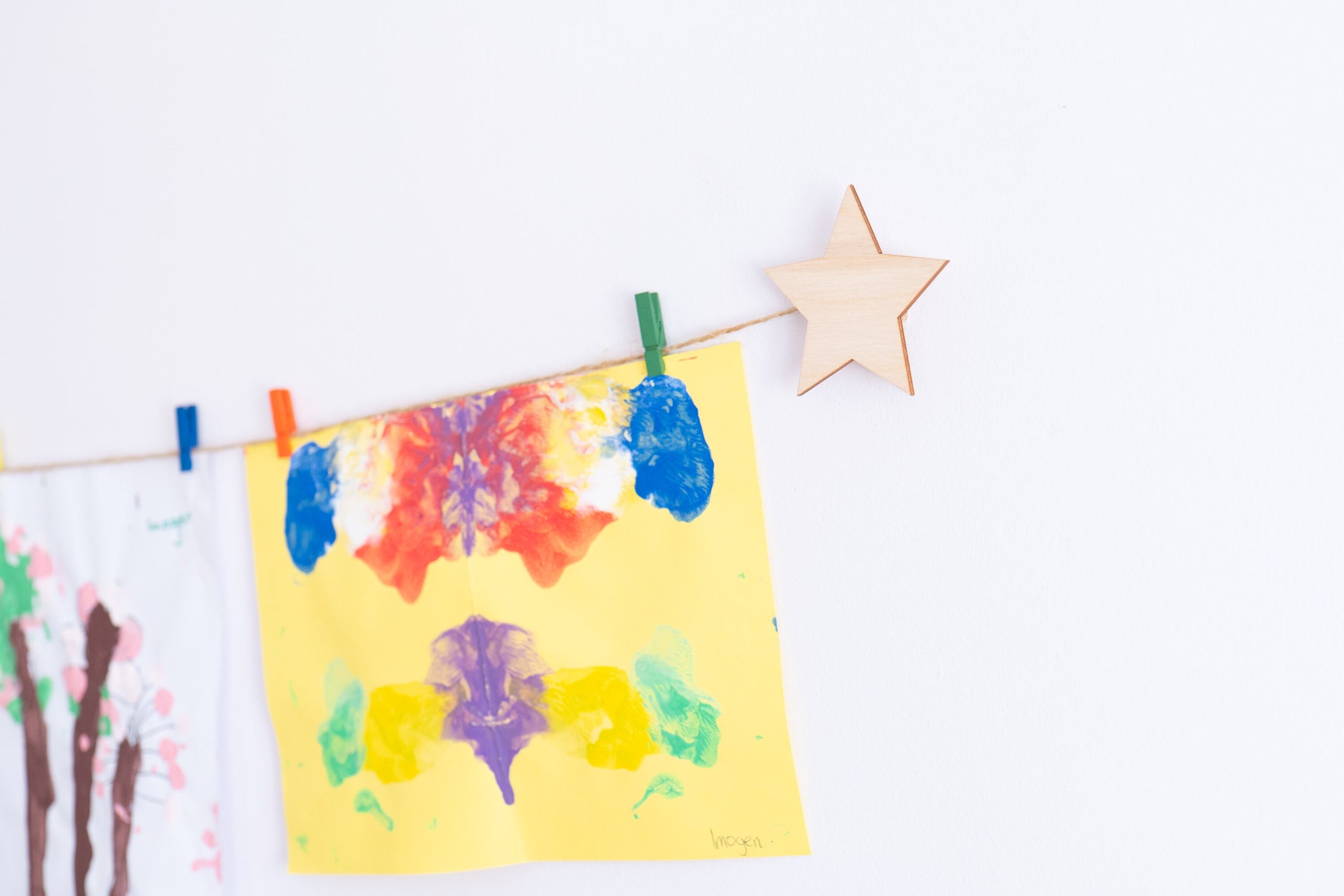 Kids art display with wooden stars