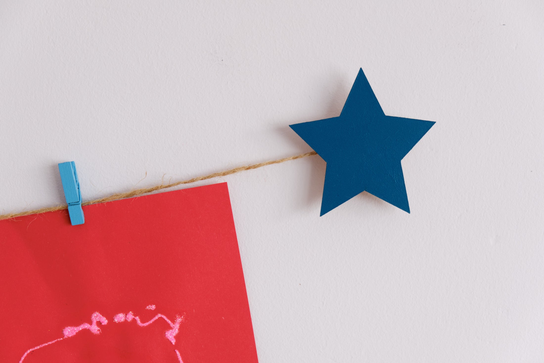Kids art display with teal stars