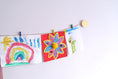 Load image into Gallery viewer, Gold circles kids art display
