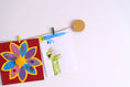 Load image into Gallery viewer, Gold circles kids art display
