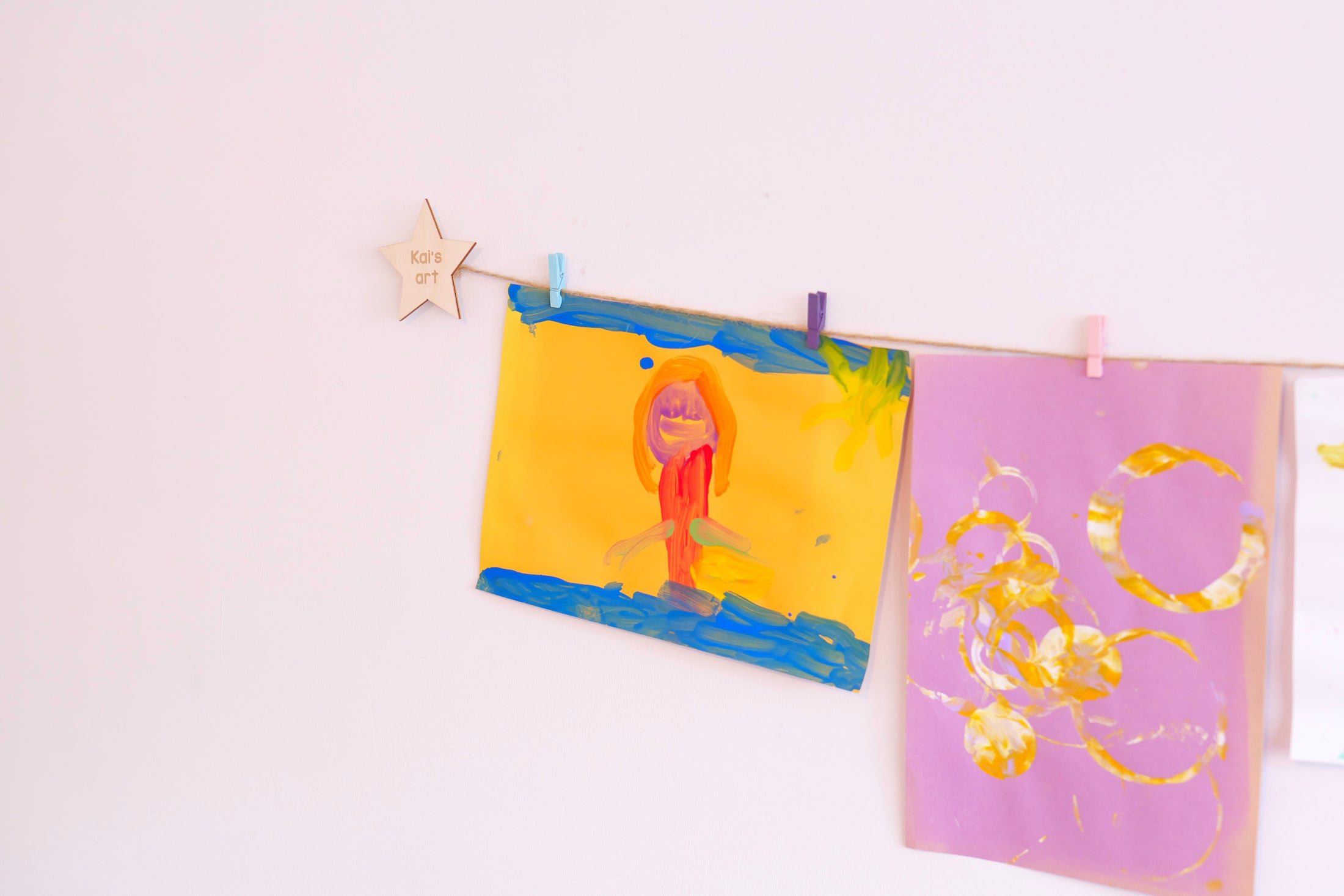 Kids art display with personalised wooden stars