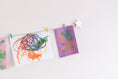 Load image into Gallery viewer, Kids art display with metallic pink stars
