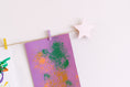 Load image into Gallery viewer, Kids art display with metallic pink stars
