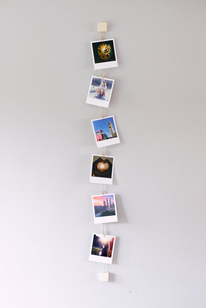 Wood and twine vertical photo display
