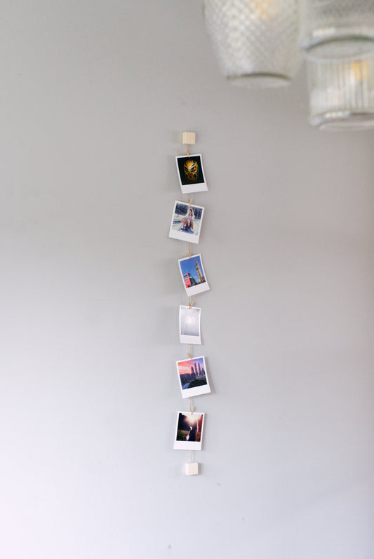 Wood and twine vertical photo display