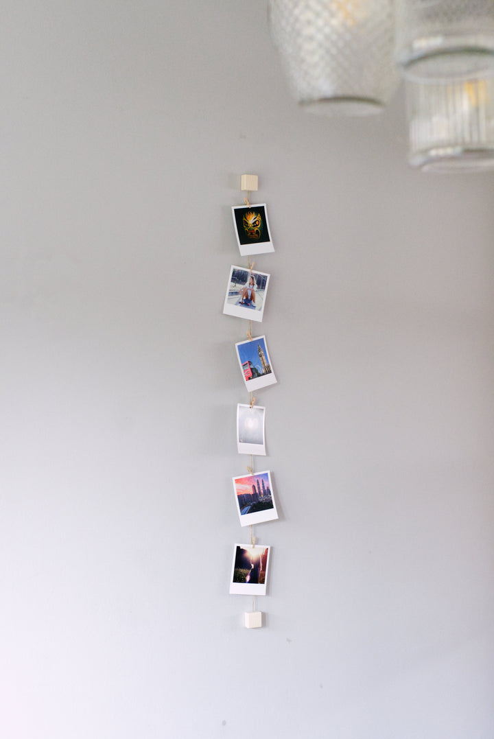 Wood and twine vertical photo display