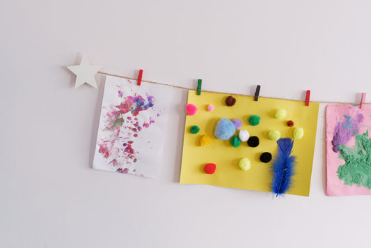Kids art display with white stars