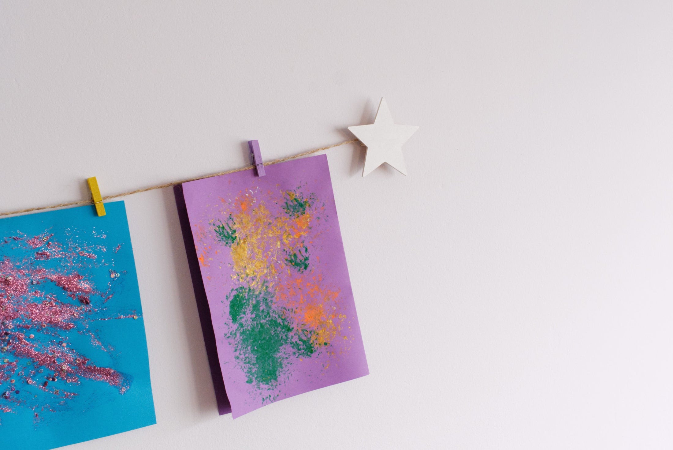 Kids art display with white stars