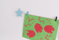 Load image into Gallery viewer, Kids art display with blue stars
