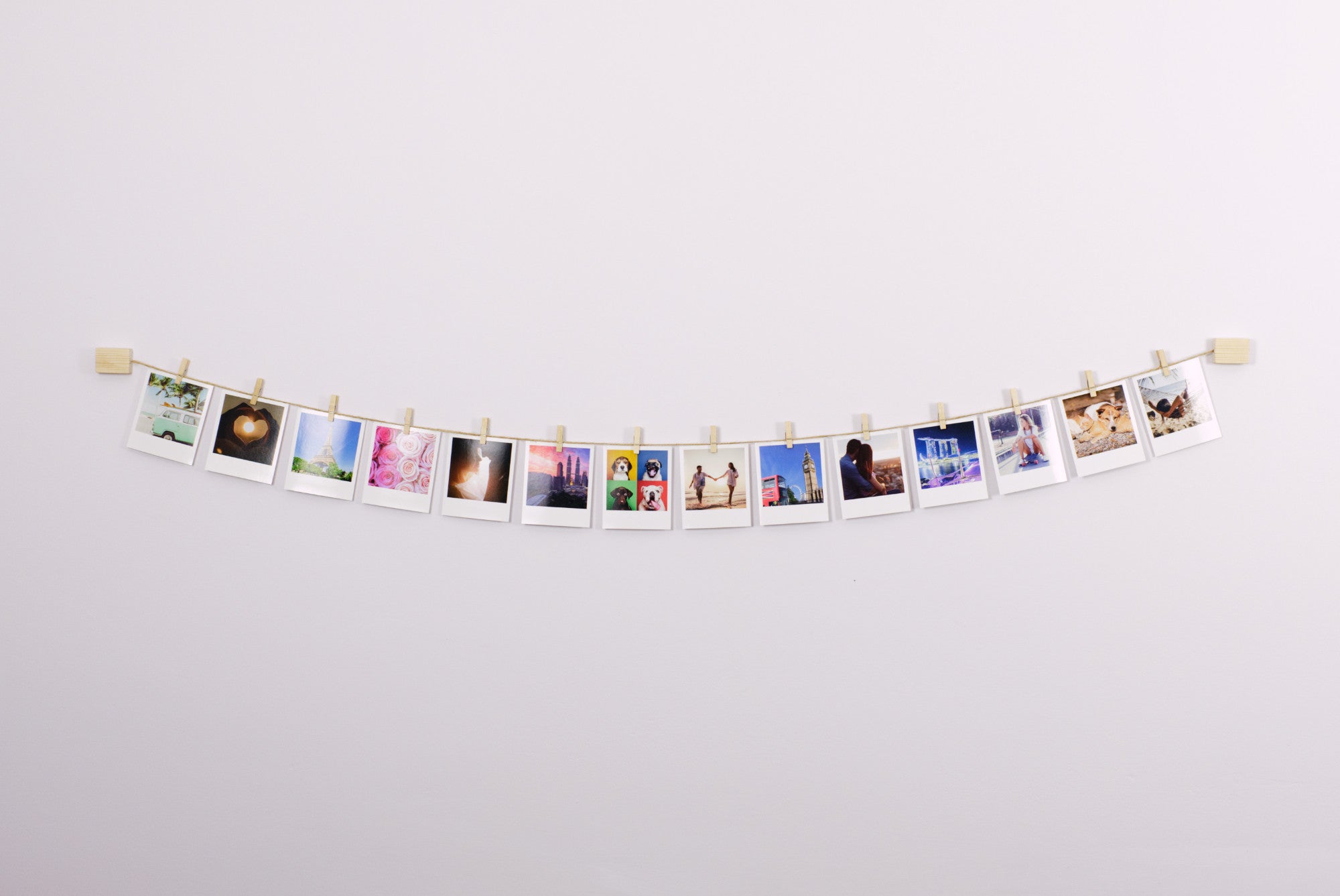 Natural wood and twine clothespeg photo display