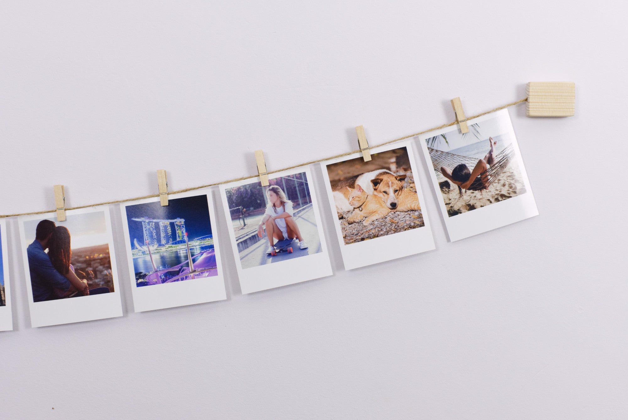 Natural wood and twine clothespeg photo display